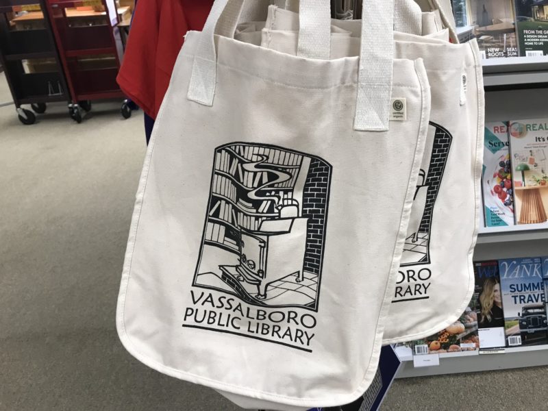 A tote bag with the VPL logo on it